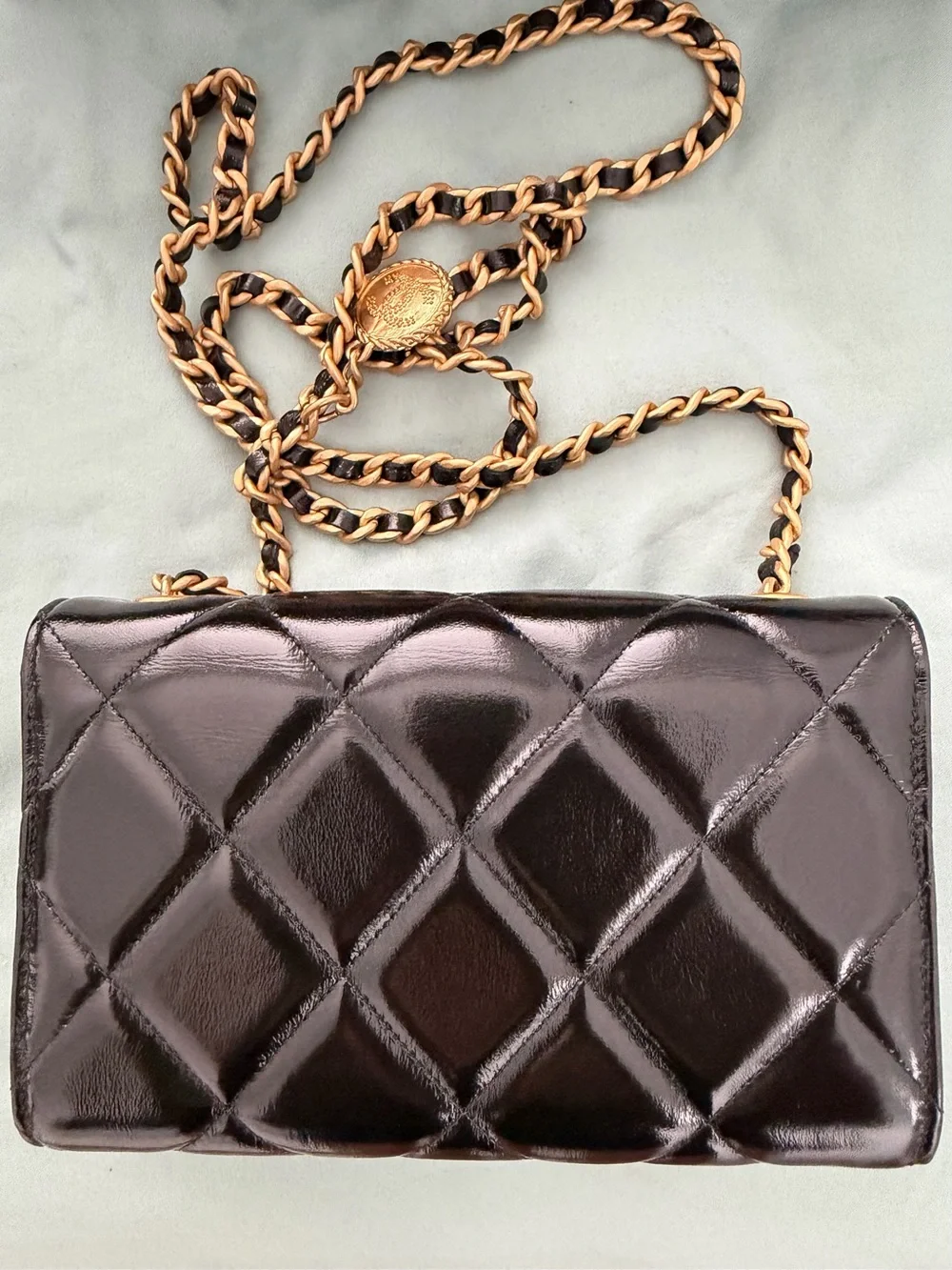 CHANEL Black Quilted Patent Leather Mini Flap with Gold Hardware